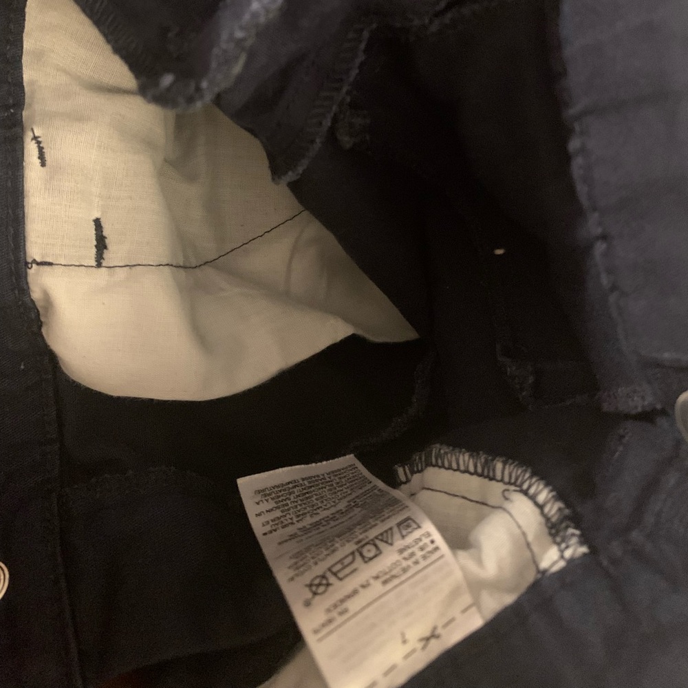 Worn girls navy uniform shorts